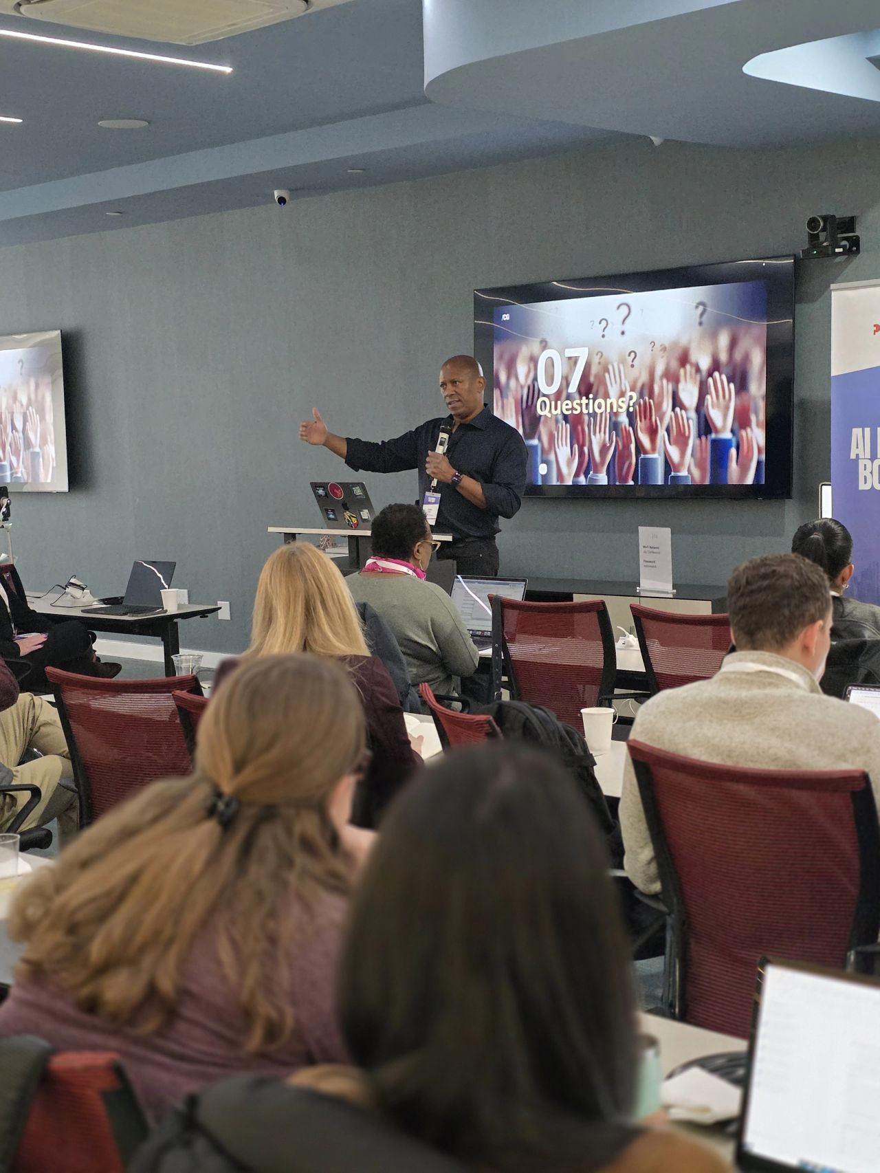 Chris Gee presenting at an AI workshop